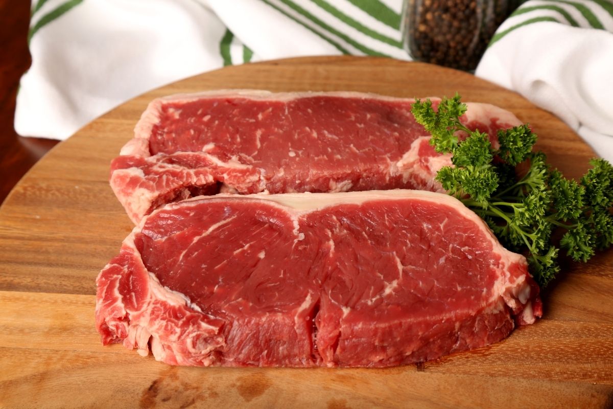 What Are The Similarities Between A New York Strip And A Ribeye Steak