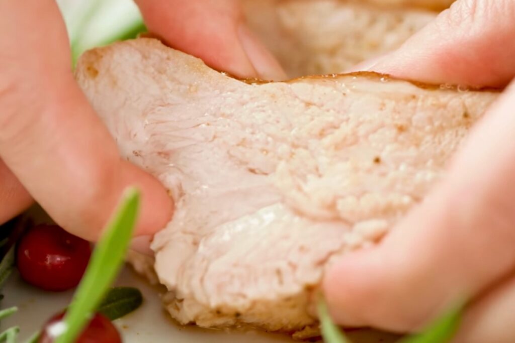 Squeezing turkey breast